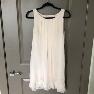 Sundress with ruffles on bottom trim and back!